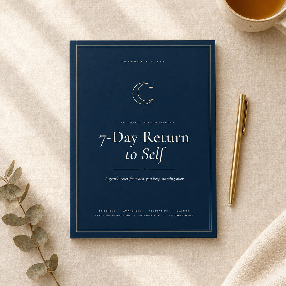 The 7-Day Return to Self workbook on a linen table with tea